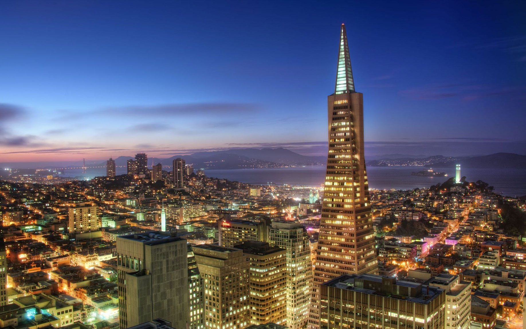 San Francisco glows in the evening with our Deluxe Evening Tour