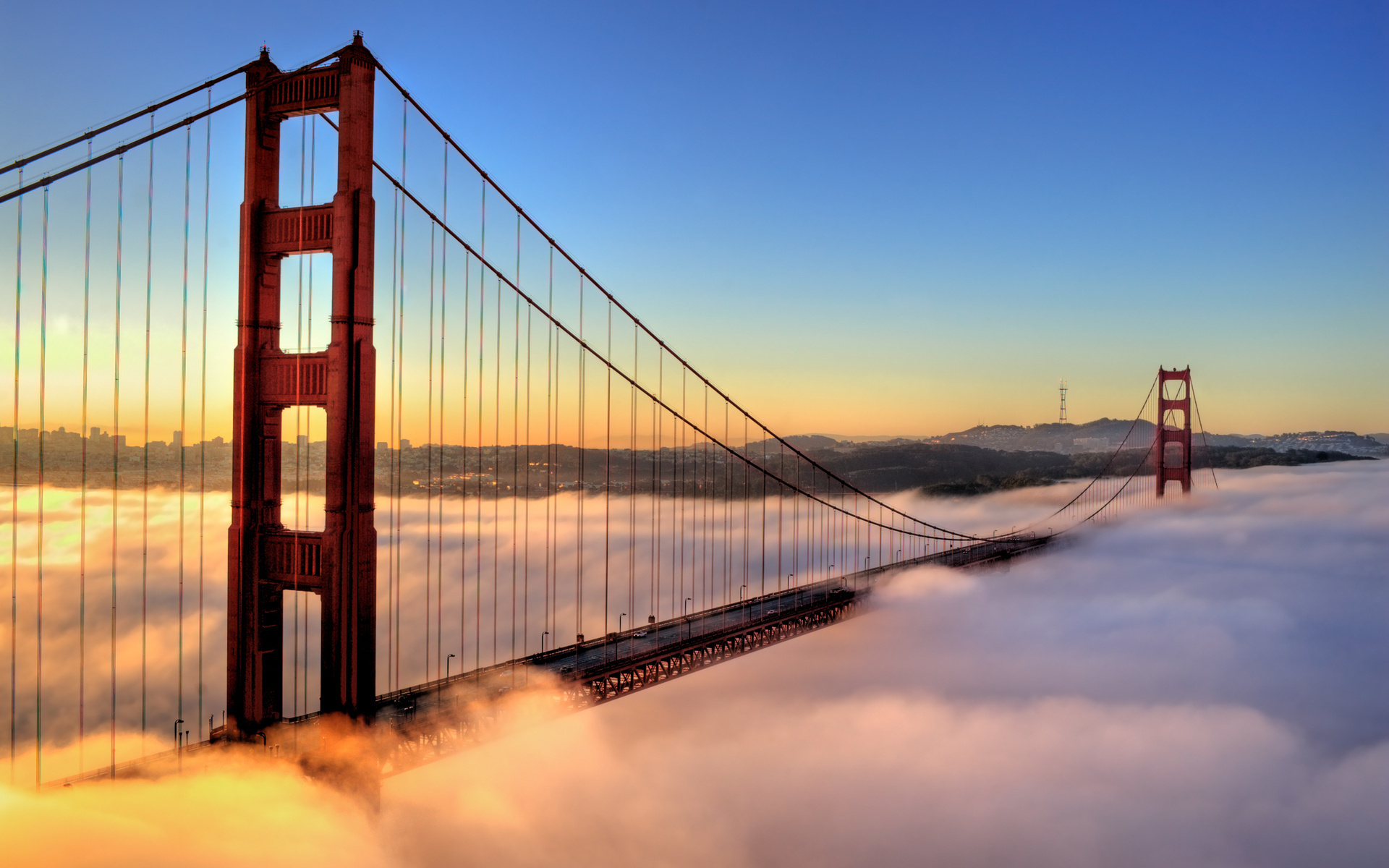 A cloud covered Golden Gate Bridge | San Francisco Deluxe Sightseeing Tours